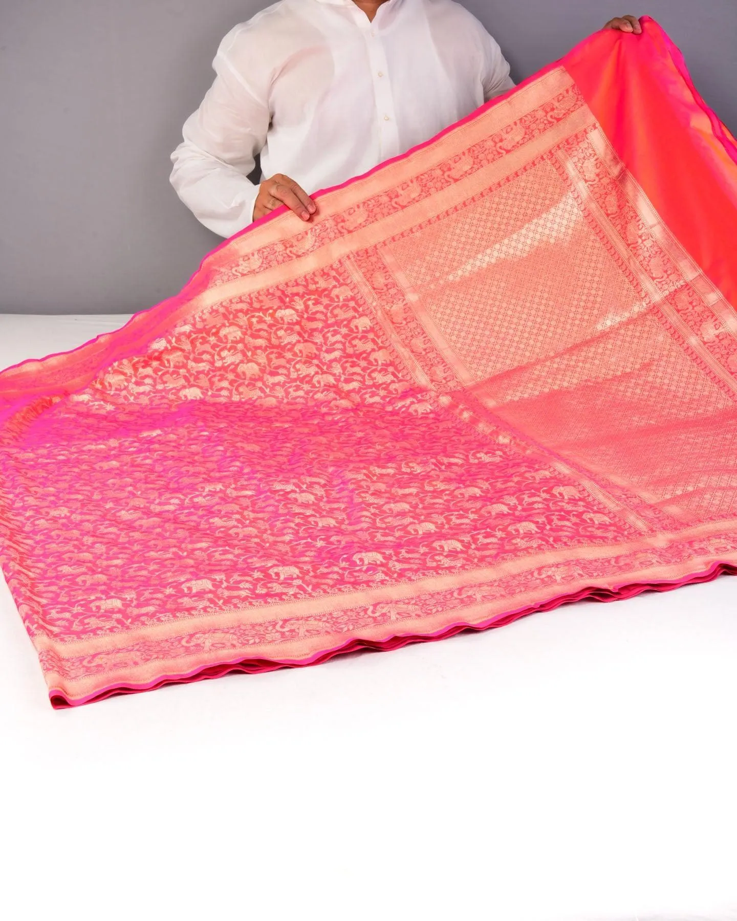Shot Pink-Orange Banarasi Shikargah Cutwork Brocade Handwoven Katan Silk Saree with Elephant Trail Border