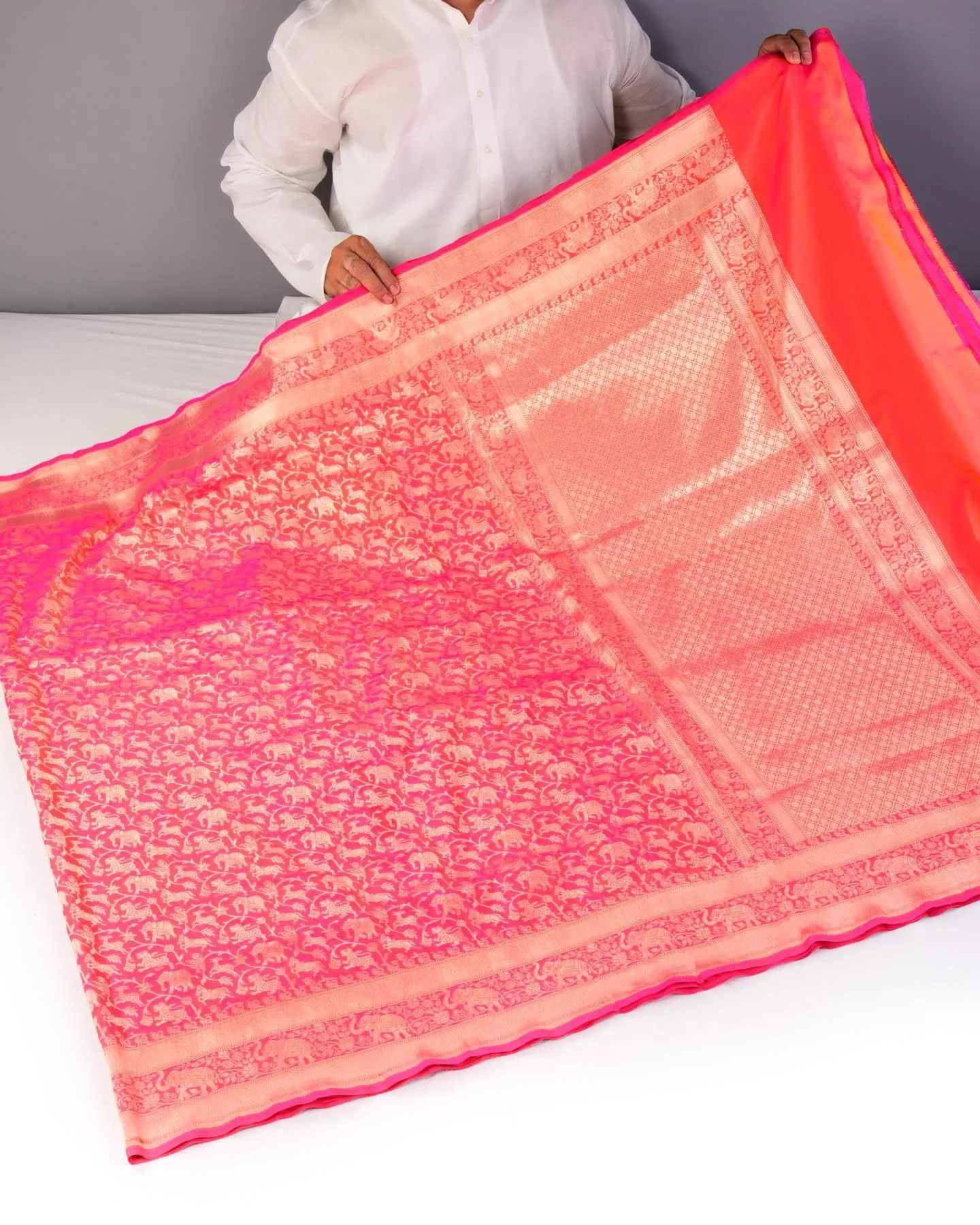 Shot Pink-Orange Banarasi Shikargah Cutwork Brocade Handwoven Katan Silk Saree with Elephant Trail Border
