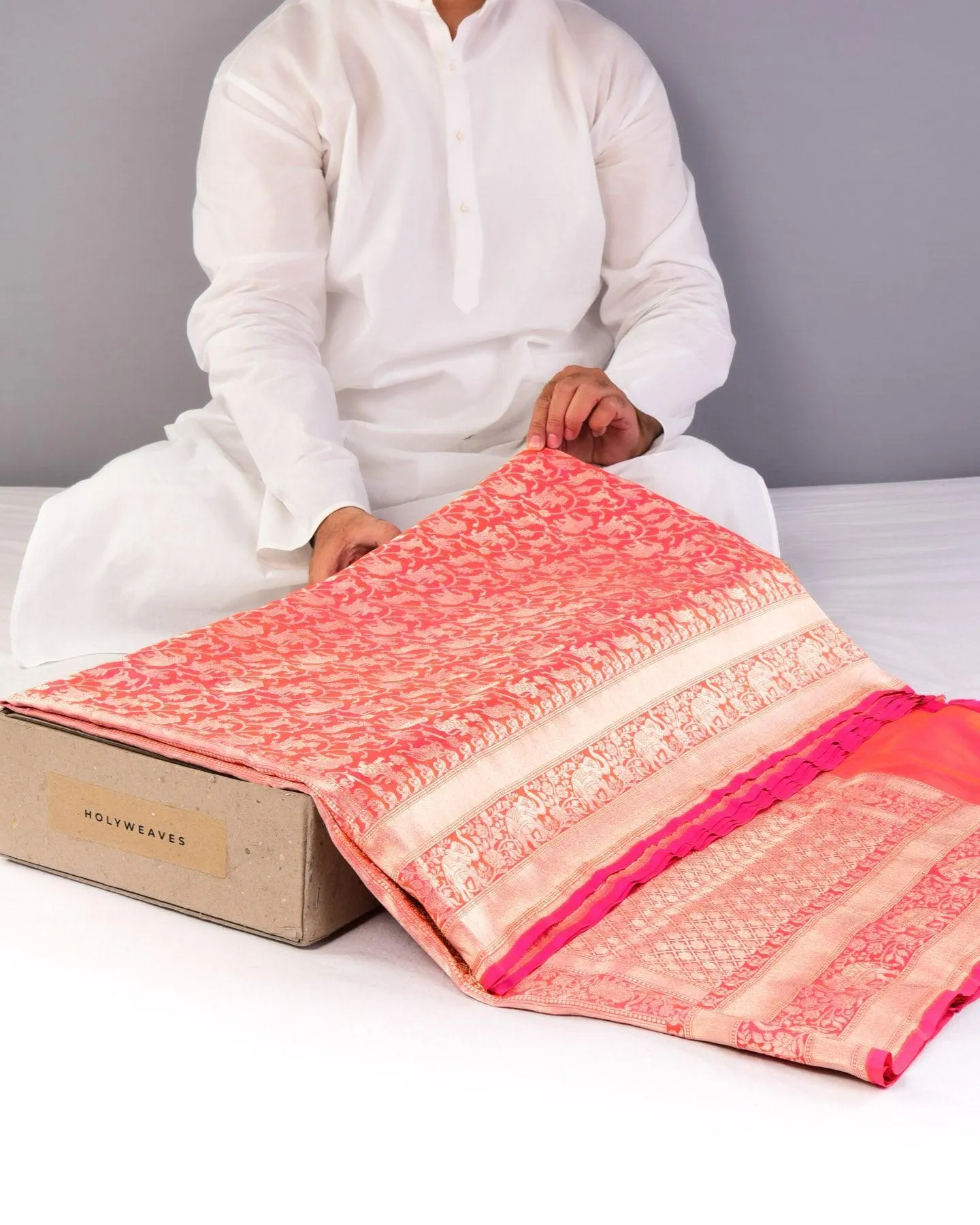 Shot Pink-Orange Banarasi Shikargah Cutwork Brocade Handwoven Katan Silk Saree with Elephant Trail Border